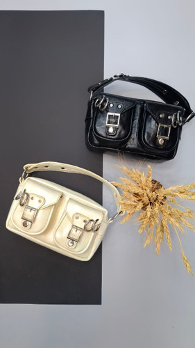 "کیف زنانه مدل بنگل با طراحی ظریف و لوکس، ترکیبی از زیبایی و کارایی."